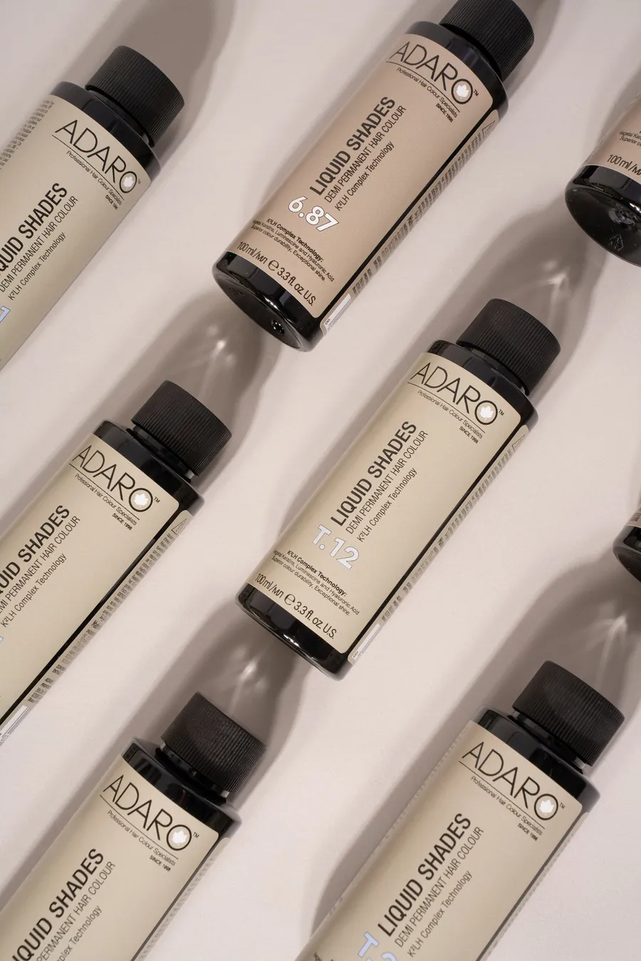 Adaró Liquid Shades demi-permanent color bottles