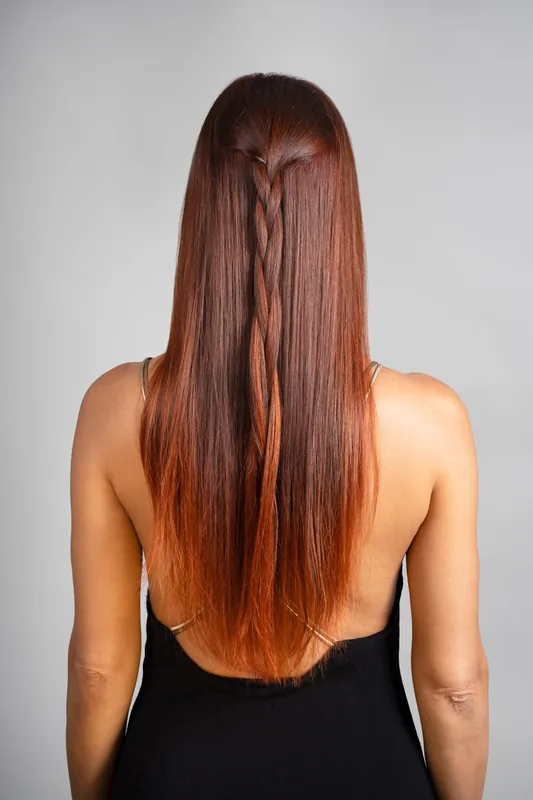 Copper hair color with a braid